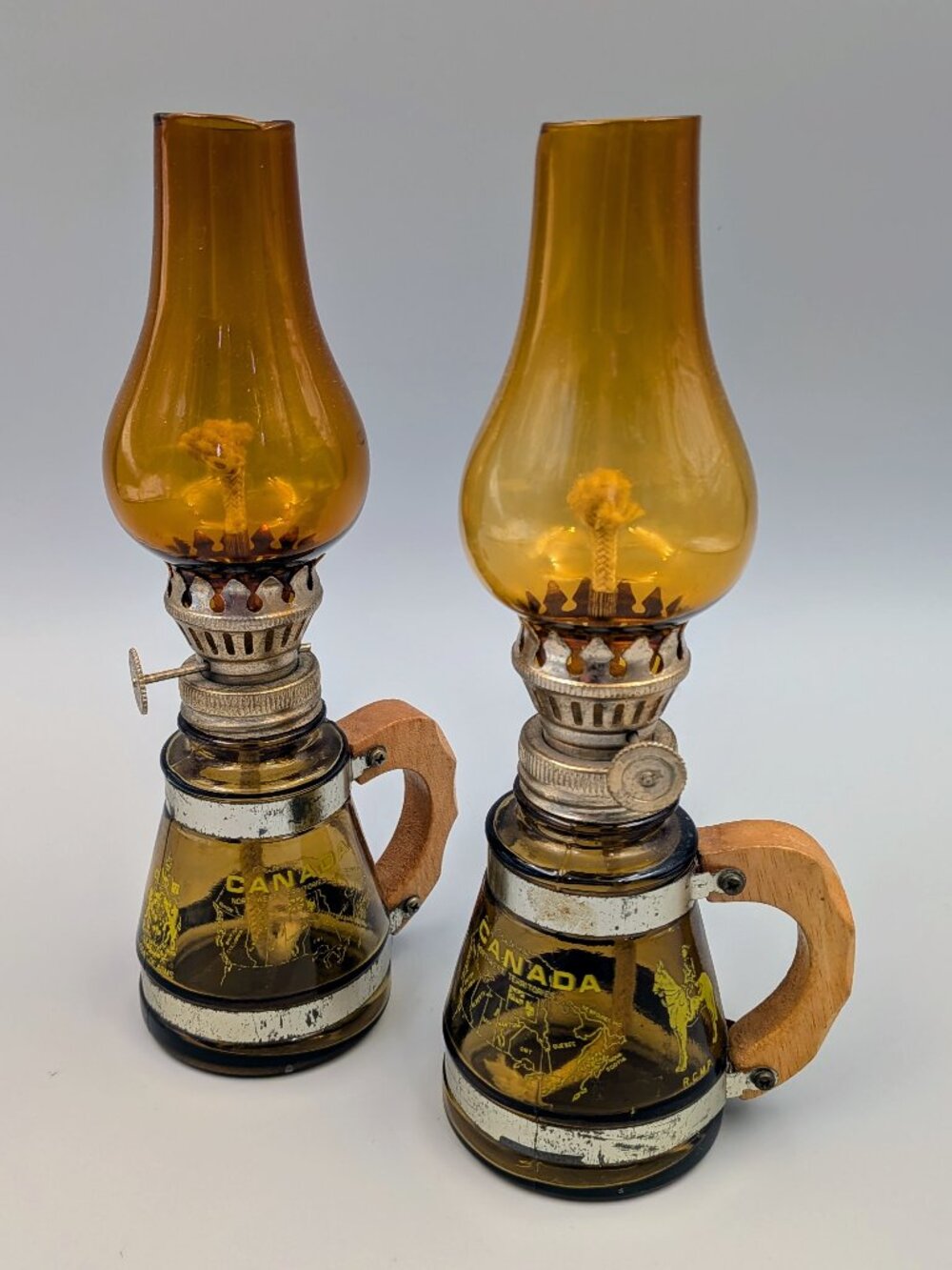 Vintage Pair Miniature Amber Glass Canada Souvenir Oil Lamps with Wood Handles